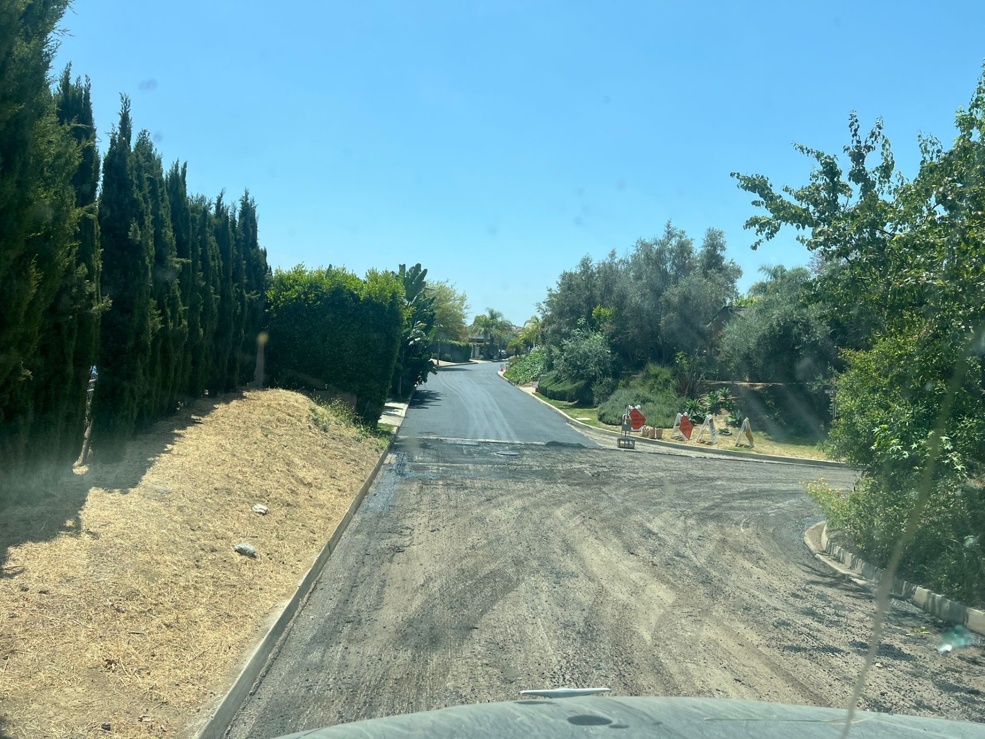 Sub-grade prep · Hillside access road