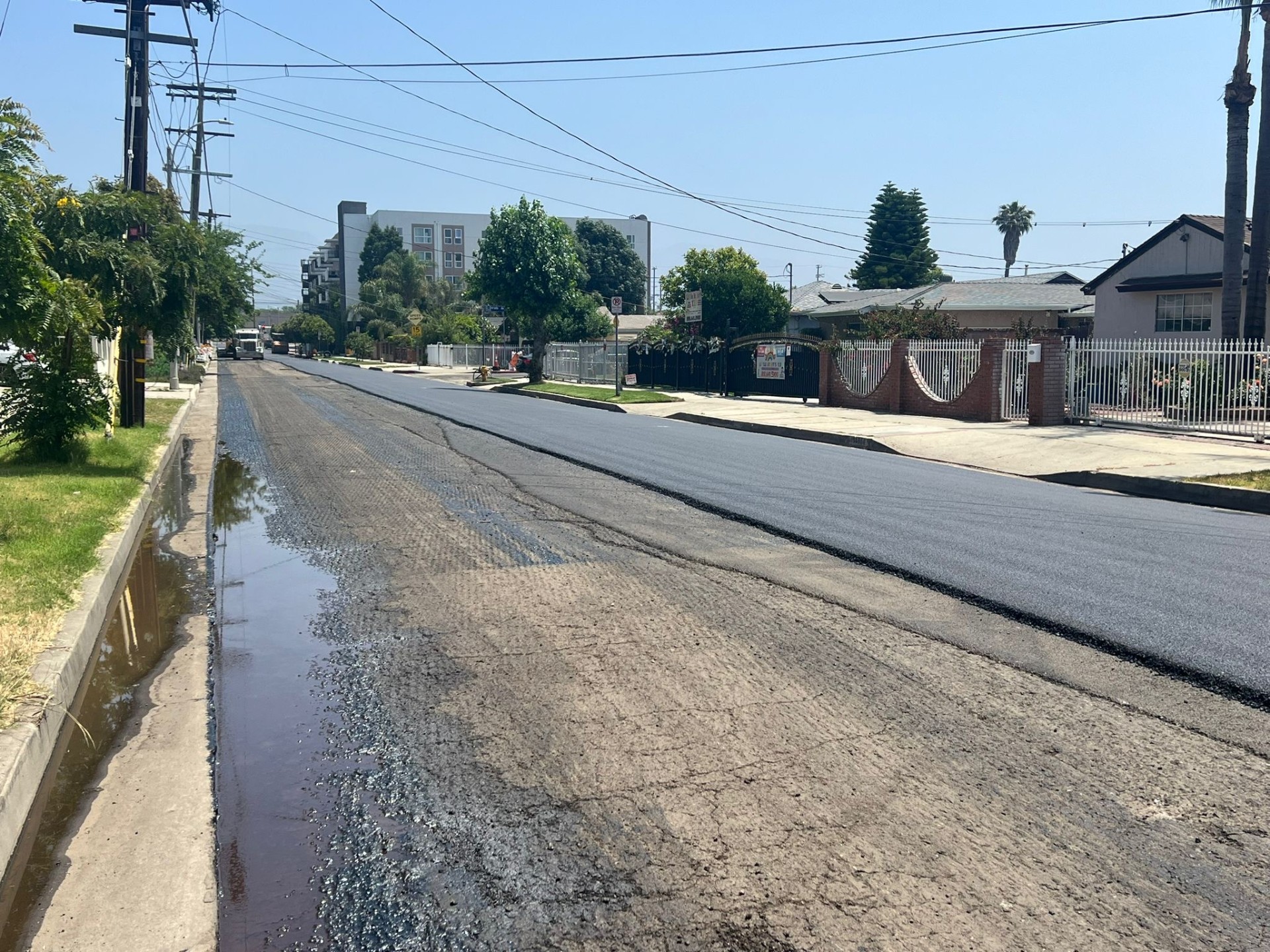 Full-width street paving · Tack coat & overlay