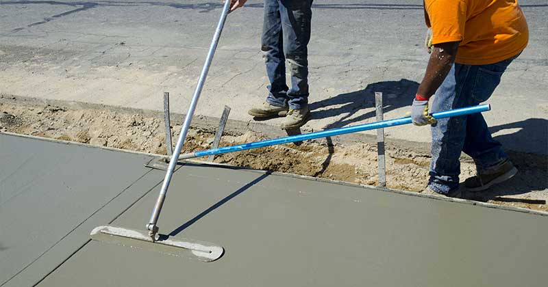 Bull-float finishing · Crew at work