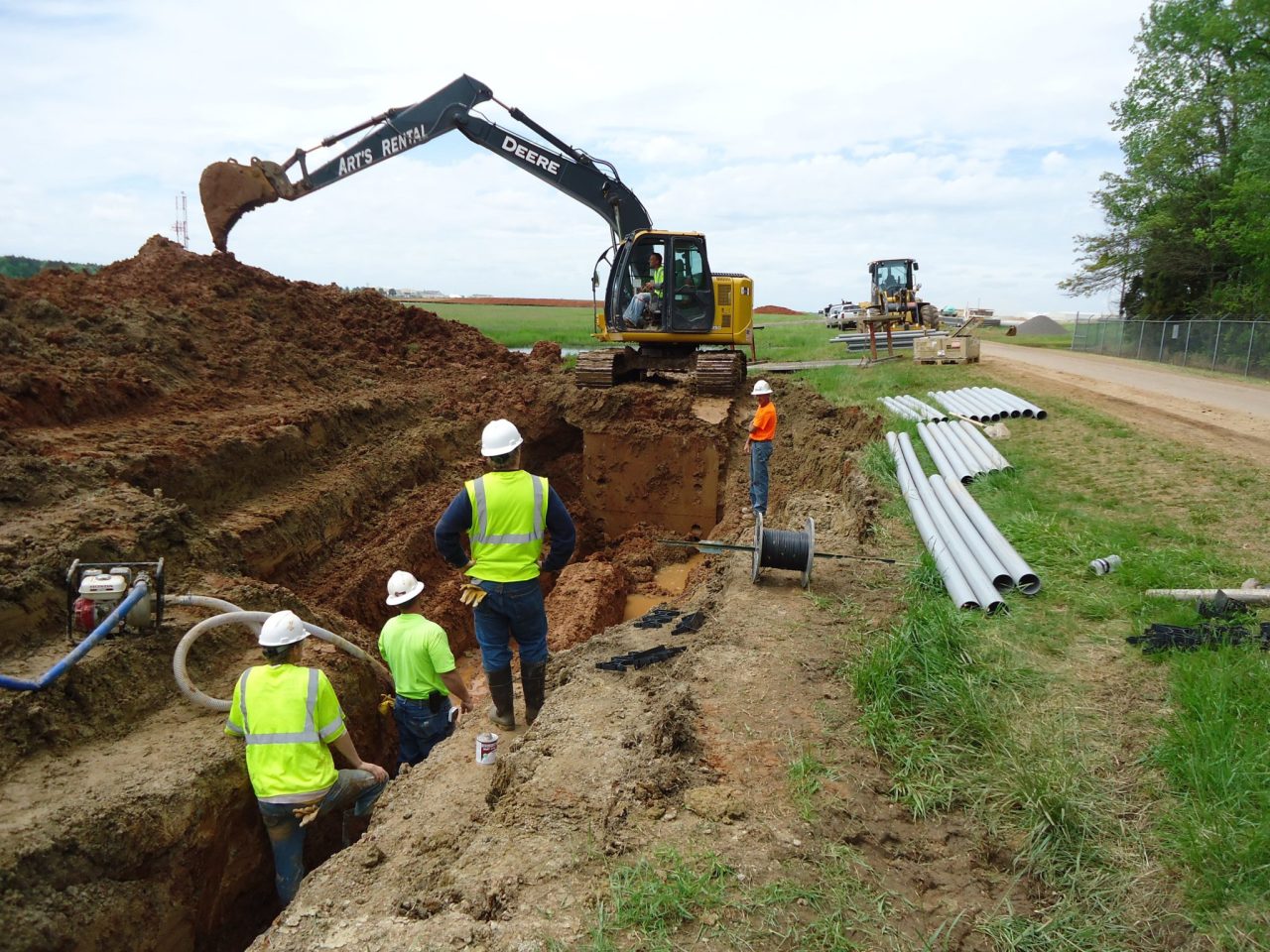 Utility trench · Crew & excavator