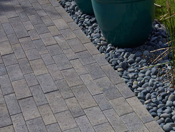 Paver walkway with river-rock border